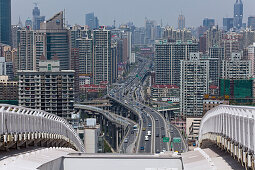 The Lupu bridge in front of the high rise buildings of Shanghai, China, Asia