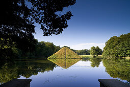 Pyramid in the Pyramide Lake in the grounds of Branitz castle, Fürst Pückler Park near Cottbus, Brandenburg, Germany, Europe