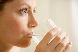 Woman drinking a glass of water