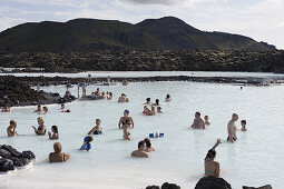 People bathing in hot thermal water, Blue lagoon, Grindavik, Reykjanes, Iceland, Europe