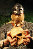 Wax figure of a viking holding a skull in his hands, museum of vikings, Haugesund, Rogaland, Norway, Scandinavia, Europe