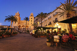 Open-air restaurant near Cathedral-Basilica of Cefalu, Sicily, Italy