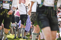 Young people wearing traditional costumes, May Running, Antdorf, Upper Bavaria, Germany