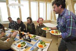 Man serving lunch, New Monte Rosa Hut, Zermatt, Canton of Valais, Switzerland