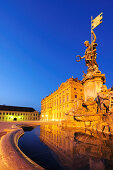 Illuminated fountain Frankoniabrunnen and Wuerzburger residence in the evening light, Wuerzburg, UNESCO World Heritage Site Wuerzburg, Bavaria, Germany