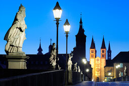 Illuminated bridge Alte Mainbruecke and city of Wuerzburg in the evening light, Wuerzburg, Bavaria, Germany