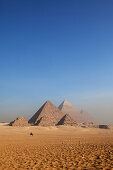 Pyramids of the Queens in the front and the pyramids of Menkaure, Khafre and Khufu (from left), Giza, Cairo, Egypt, Africa