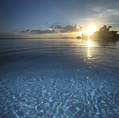 The infinity pool of a hotel at sunset, Baclayon, Bohol, Philippines, Asia
