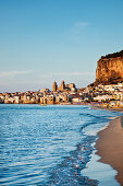 Beach, old town, cathedral and cliff La Rocca, Cefalú, Palermo, Sicily, Italy