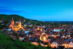 View over the town towards the illuminated cathedral, Parish church of St. Peter, Heppenheim, Hessische Bergstrasse, Hesse, Germany