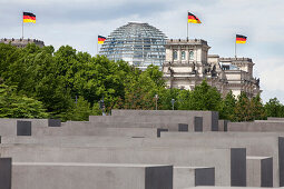 Holocaust Memorial, Reichstag building in background, Berlin, Germany
