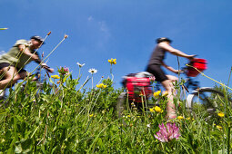 Cyclists passing Isar Cycle Route, Lower Bavaria, Germany