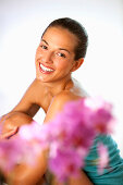 Young woman smiling at camera, portrait, Vienna, Austria