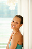 Young woman smiling at camera, portrait, Vienna, Austria