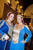 Young women perform at Bunratty Castle Medieval Banquet, County Clare, Ireland
