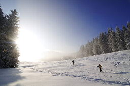 People hiking on winter hiking trail, Reit im Winkl, Chiemgau, Upper Bavaria, Bavaria, Germany, Europe