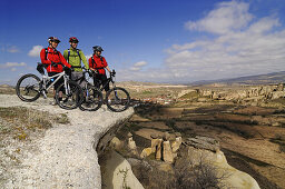 Mountain bikers near Cavusim, Göreme valley, Göreme, Cappadocia, Turkey