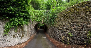 Deserted alley with tunnel, Le Puy-en-Velay, Haute Loire, Southern France, Europe