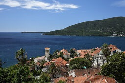 View over the roofs of the old town of Herceg Novi onto the Bay of Kotor, Montenegro, Europe