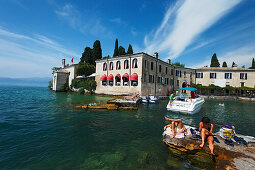 Couple, lazy, Punta San Vigilio, Hotel, Restaurant, Garda, Lake Garda, Veneto, Italy