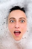 young woman face having a bath