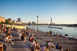 People on stairs at Rhine promenade, Düsseldorf, Duesseldorf, North Rhine-Westphalia, Germany, Europe