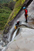 People canyoning at Canyon du Fleur Jaune bei Cilaos, La Reunion, Indian Ocean