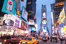 Times Square at night, yellow cabs and Illuminated Advertising, Manhattan, New York City, United States of America, USA