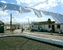Clothesline in the wind in front of fishermen's houses, coastal town Rabo de Peixe, Sao Miguel island, Azores, Portugal
