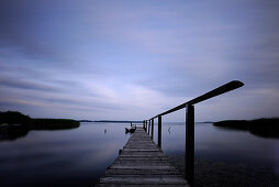 Deserted jetty at dusk, Neeberg, Achterwasser, Usedom, Mecklenburg-Western Pomerania, Germany, Europe