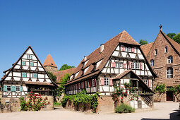 Half-timbered houses at courtyard of monastery Kloster Maulbronn, Maulbronn, Baden-Wuerttemberg, Germany, Europe