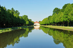 Lustheim castle reflecting in the canal, Schleissheim, Munich, Bavaria, Germany, Europe