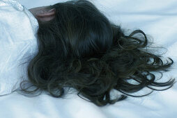 Little girl sleeping, head and shoulders, rear view