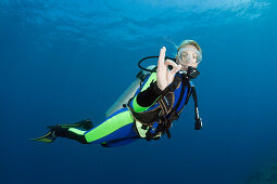 Scuba Diver shows O.K. Signal, Wakaya, Lomaiviti, Fiji