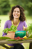 Young woman preparing salad