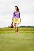 Young woman holding a bouquet of flowers