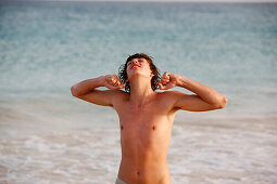 Cape Verde Peninsula, Sal, Santa Maria beach, teen boy