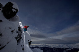 Female skier jumping, Chandolin, Anniviers, Valais, Switzerland