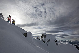 Two skiers ascending, Chandolin, Anniviers, Valais, Switzerland