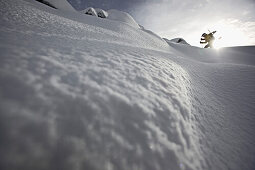 Snowboarder ascending, Chandolin, Anniviers, Valais, Switzerland