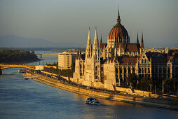 House of Parliament at Danube river in the light of the evening sun, Budapest, Hungary, Europe