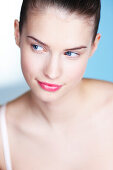 Portrait of young woman looking away