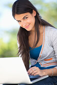Portrait of a woman using a laptop