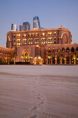 Emirates Palace hotel and high-rise buildings at dusk, Abu Dhabi, United Arab Emirates