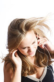 Teenage girl listening to MP3 player