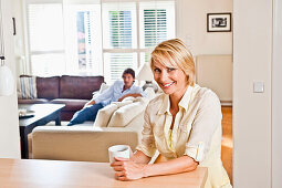 Young women with a cup, young couple, Hamburg, Germany