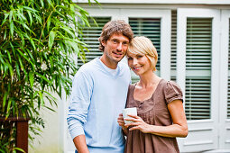 Young couple on a terrace, Hamburg, Germany