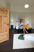 Woman and two children inside a hotel room, Fincken, Mecklenburg-Western Pomerania, Germany