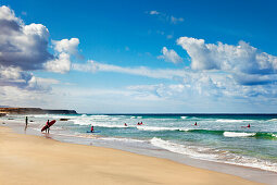 Surfer at beach, El Cotillo, Fuerteventura, Canary Islands, Spain