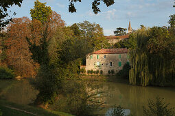 house at the banks of Baise River, spire of Cathedral Sainte-Pierre, cathedral, gothic, Condom, Condom-en-Armanac, Department Gers, Region Midi-Pyrenees, Via Podiensis, Camino de Santiago, St. James Way, France, Europe